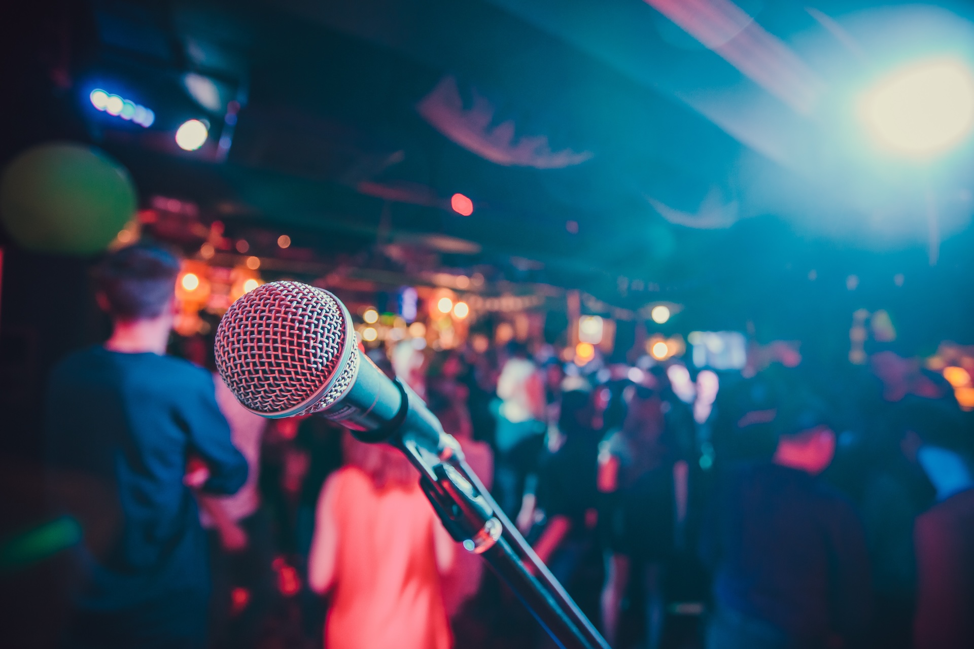 Microphone on stage against a background of auditorium