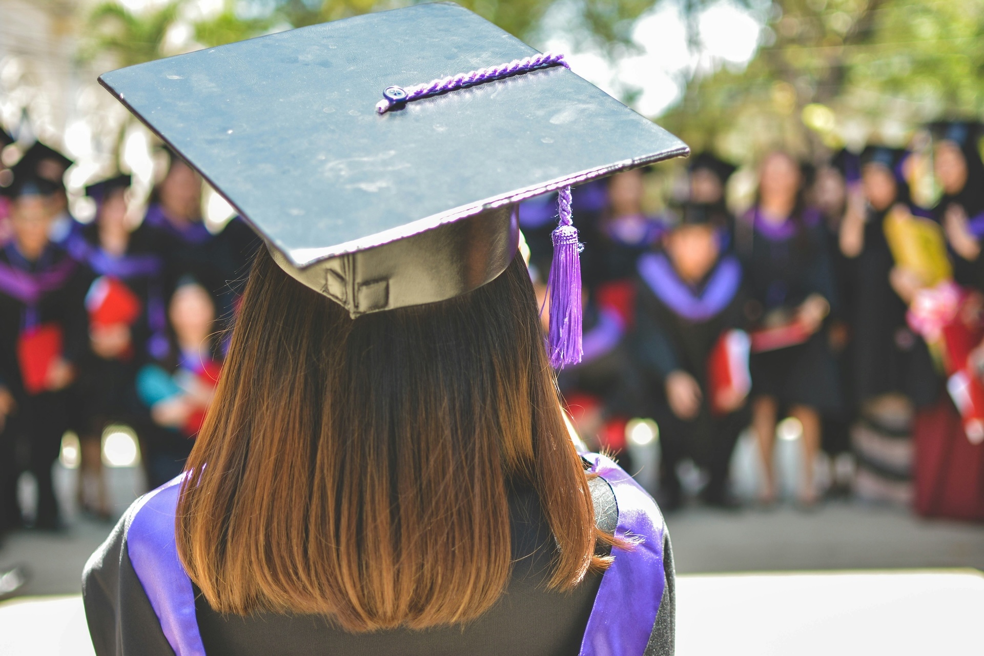woman wearing academic cap and dress