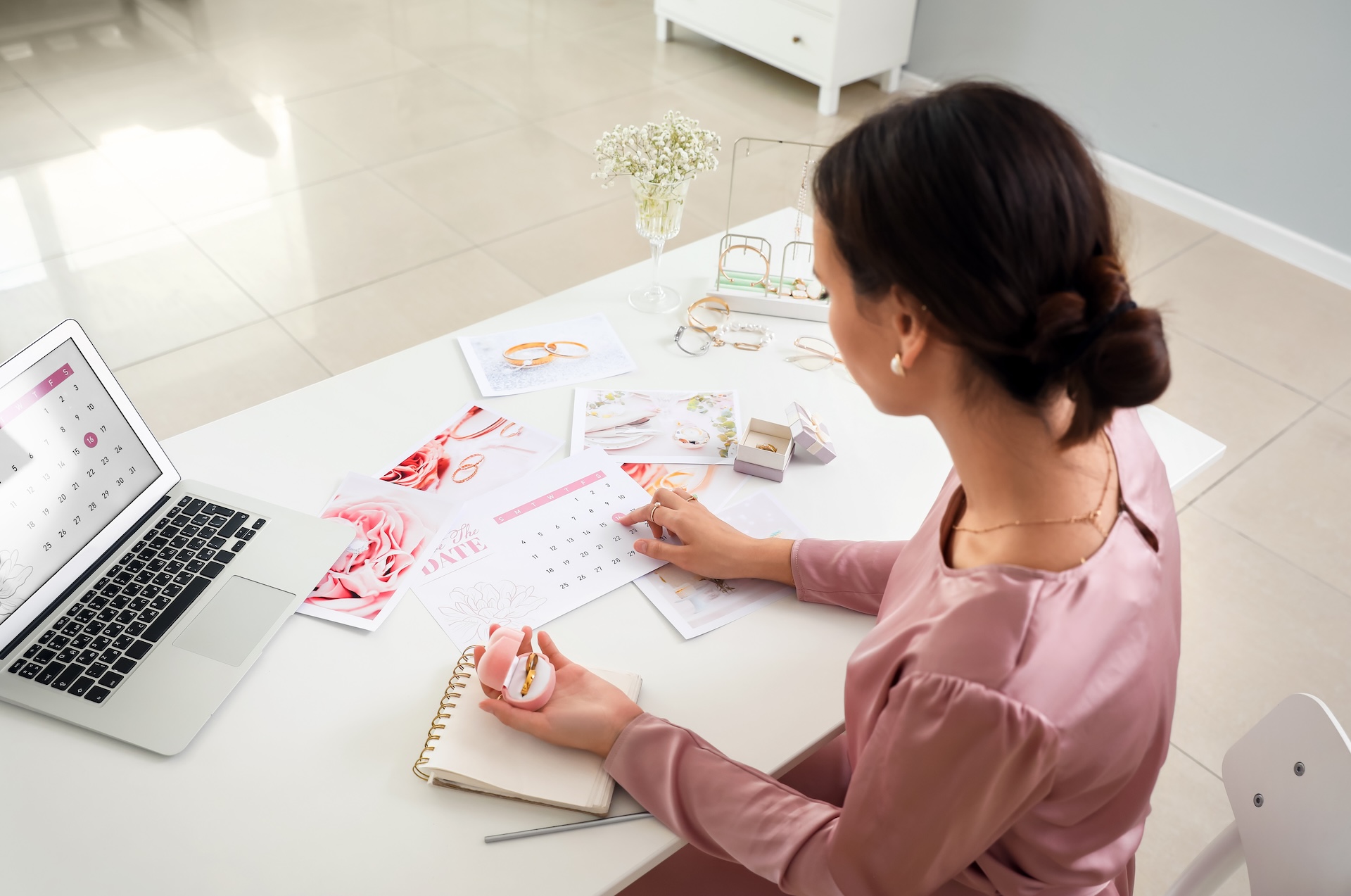 Female wedding planner working in office