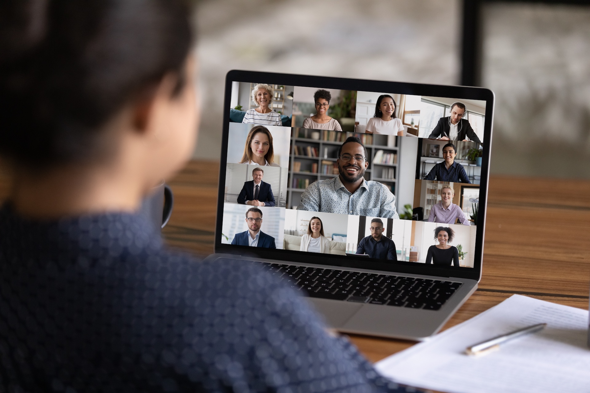 Worker have webcam digital virtual conference with diverse multiethnic colleagues
