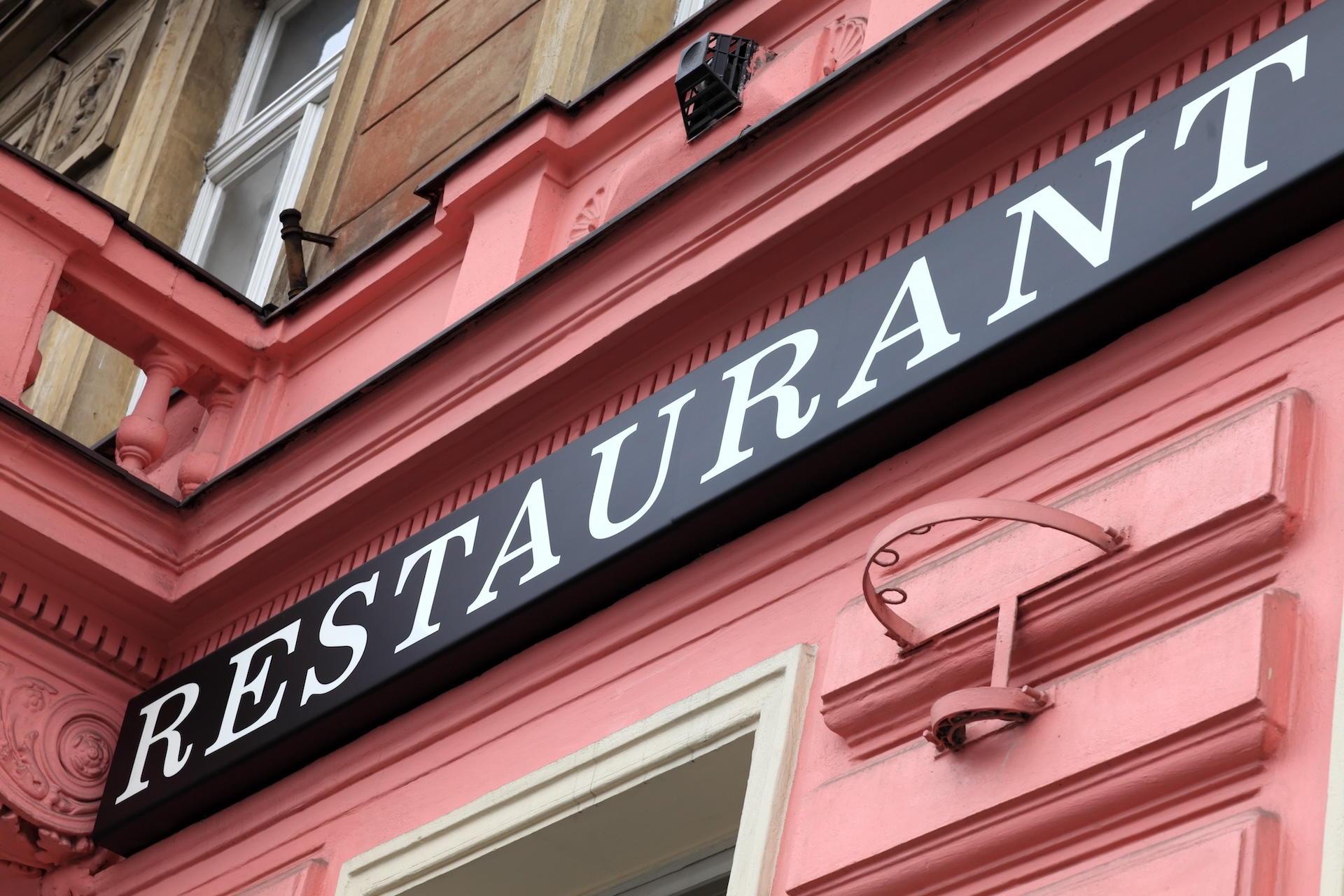 Restaurant sign on a wall