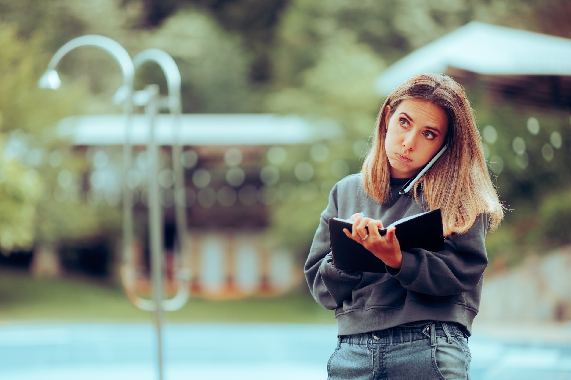 event manager consults event planning template during event