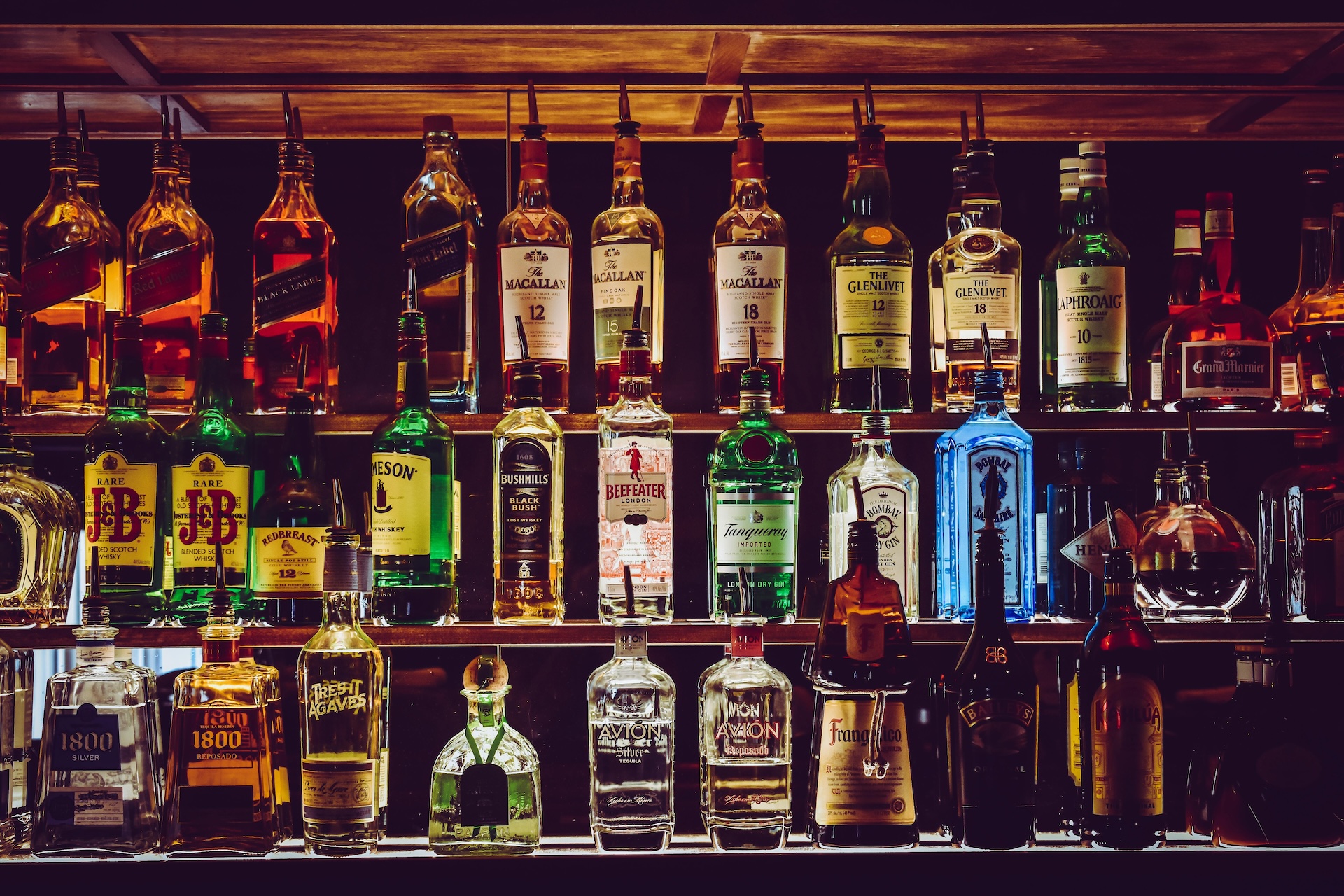 rows of alcohol bottles as bar decor