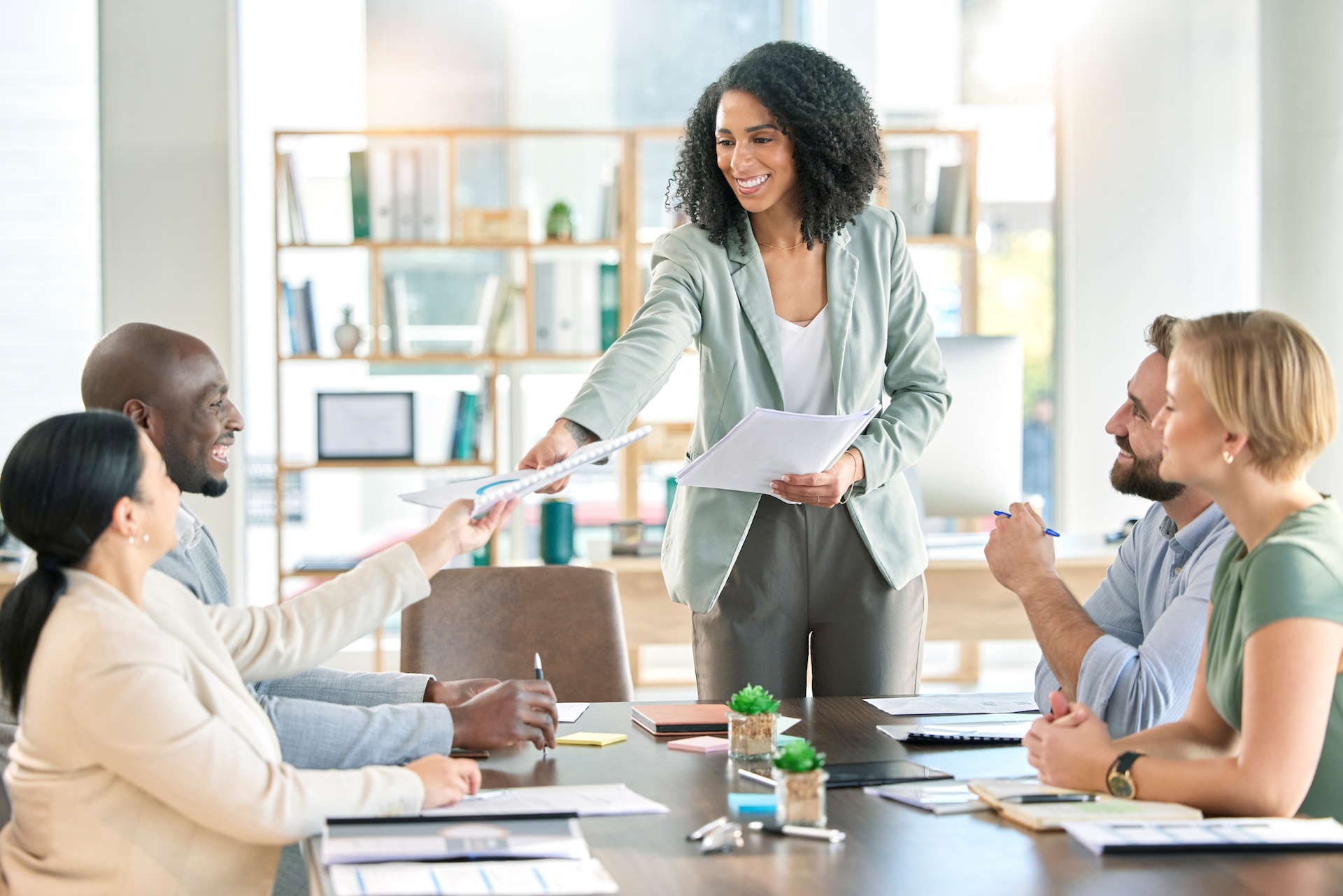event manager hands out event proposal