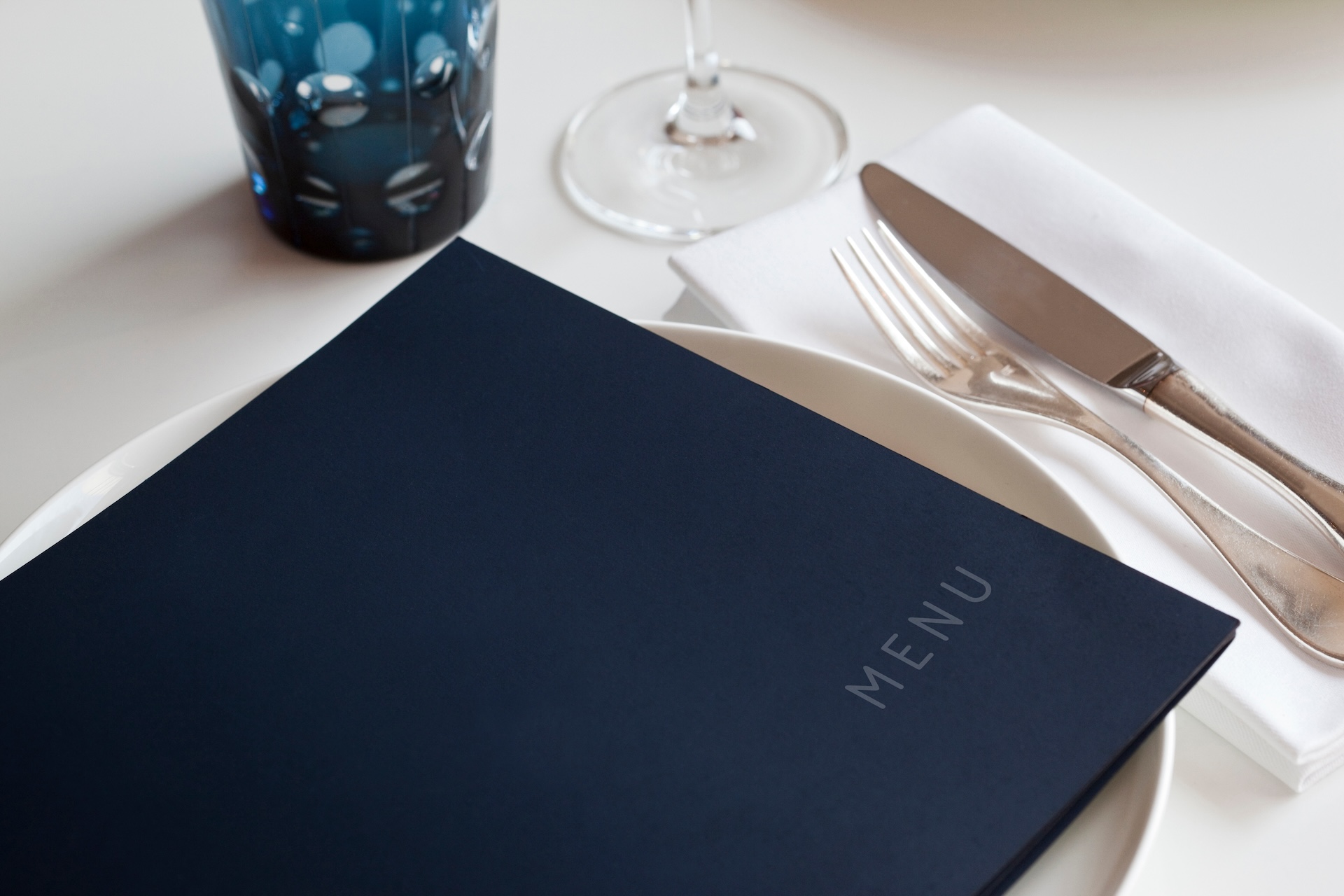restaurant menu on a place set