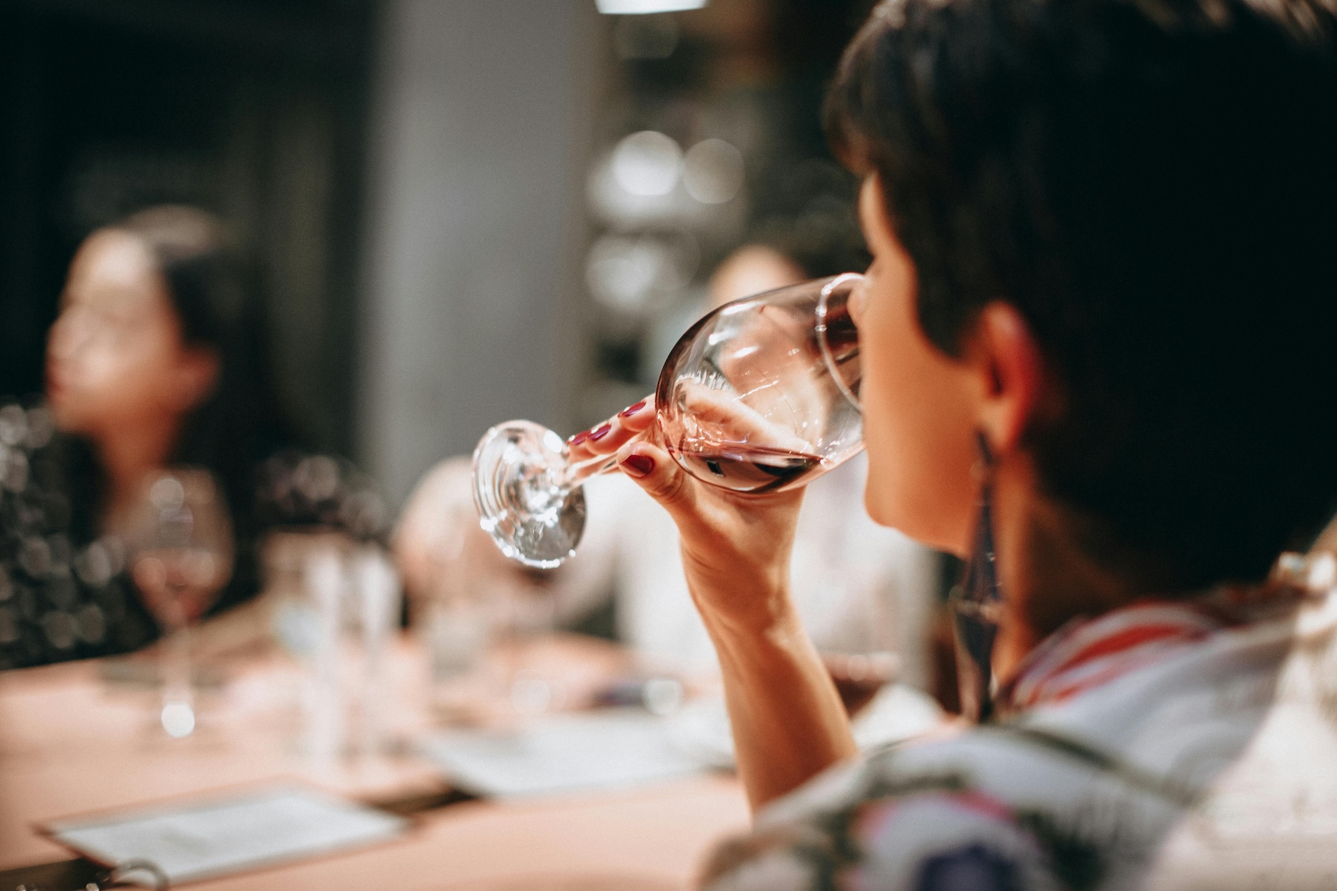 person drinking wine